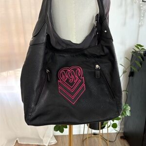 Black Women’s Shoulder Bag with Pink Crest Accent